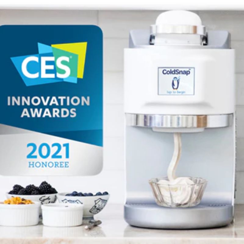 Coldsnap Ice Cream machine dispensing ice cream beside several bowls of toppings and the CES innovation Awards 2020 Honoree badge