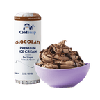 ColdSnap® Chocolate Premium Ice Cream pod next to a prepared bowl of chocolate ice cream drizzled with chocolate sauce and topped with shaved chocolate