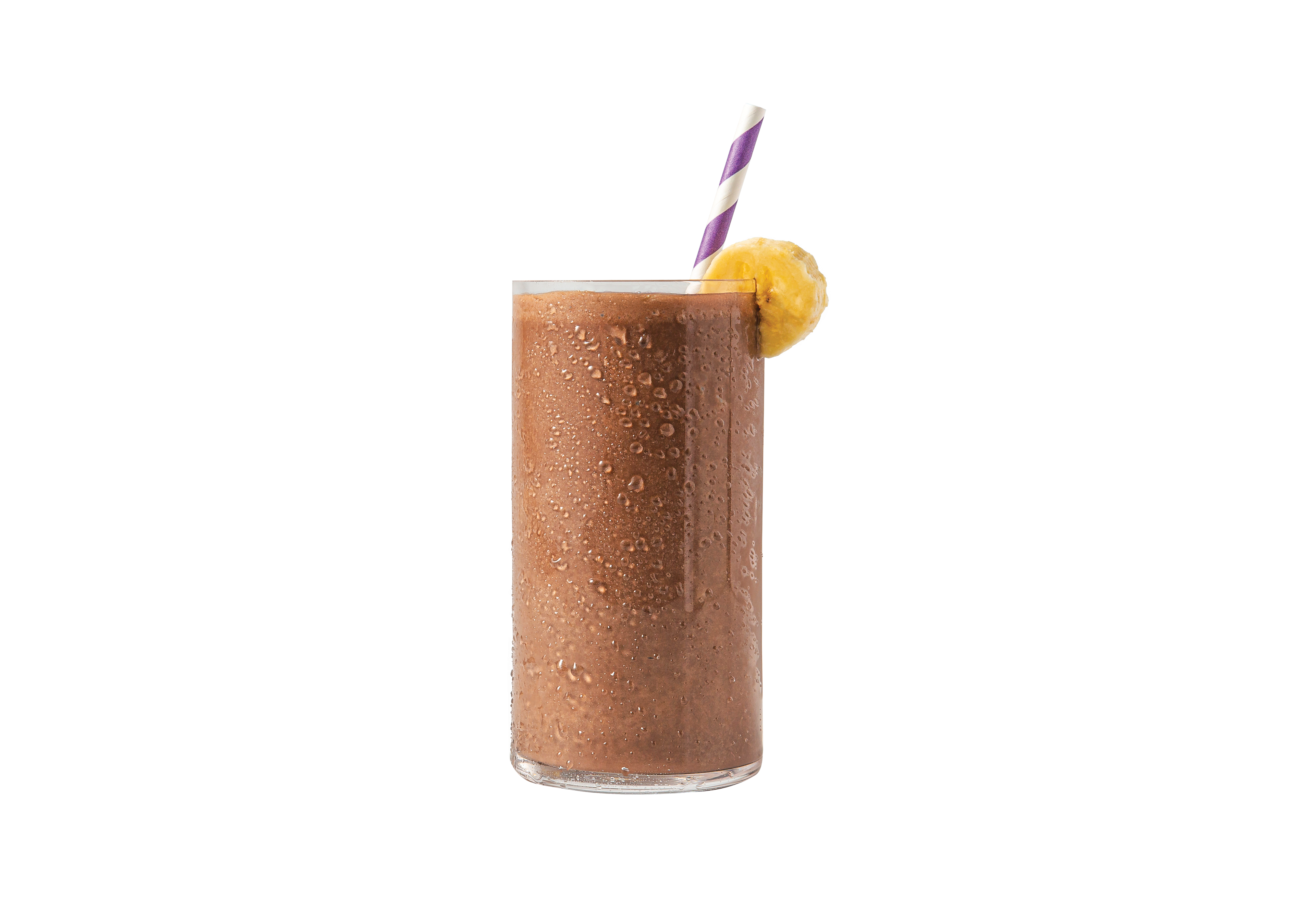 A ColdSnap Protein shake in a glass with a straw and banana slice garnish on a white background