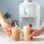ColdSnap® frozen latte and protein shake each being picked up by two hands