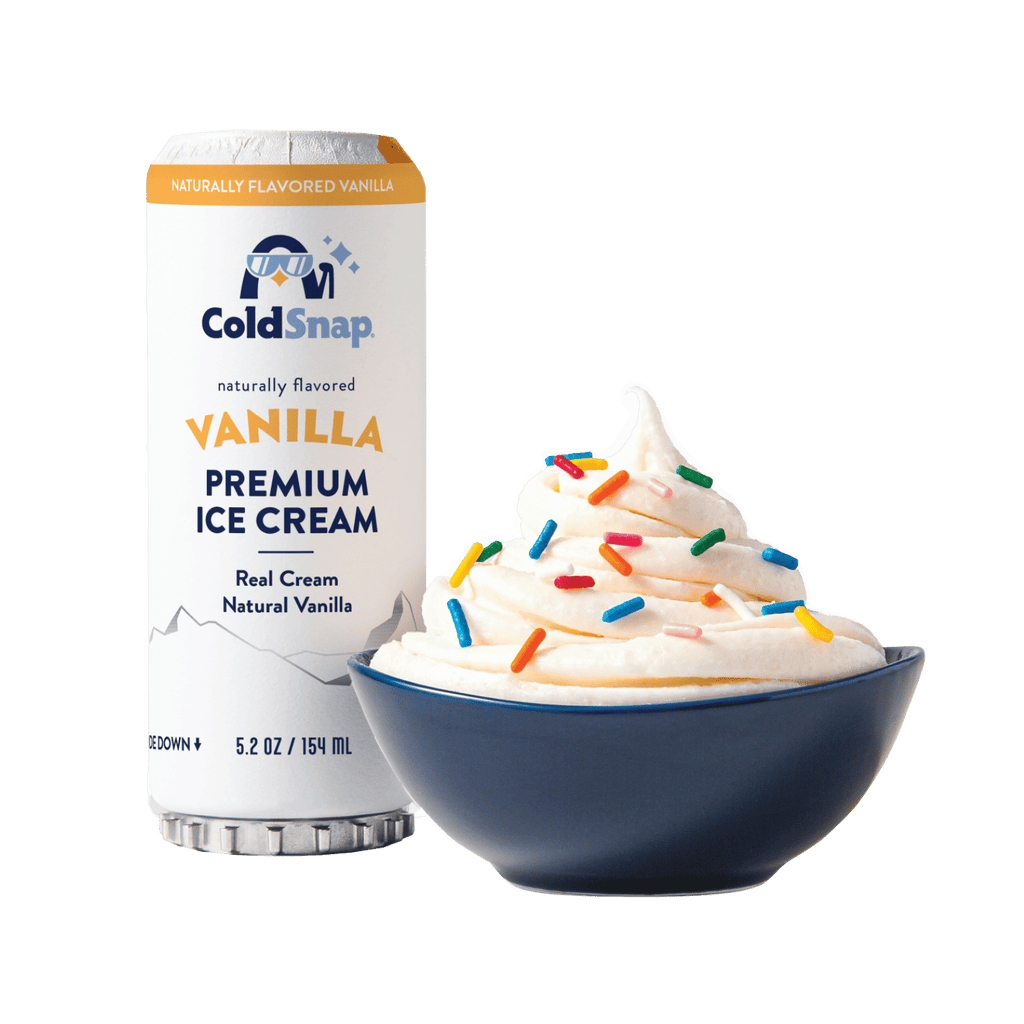 ColdSnap® Vanilla Premium Ice Cream pod next to a prepared bowl topped with colorful sprinkles in a navy blue bowl